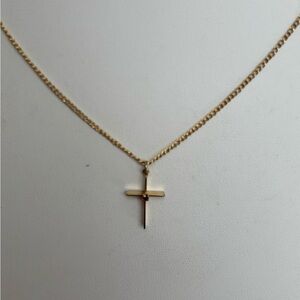 Small cross pendant necklace/ gold tone chain/measures 18 in length